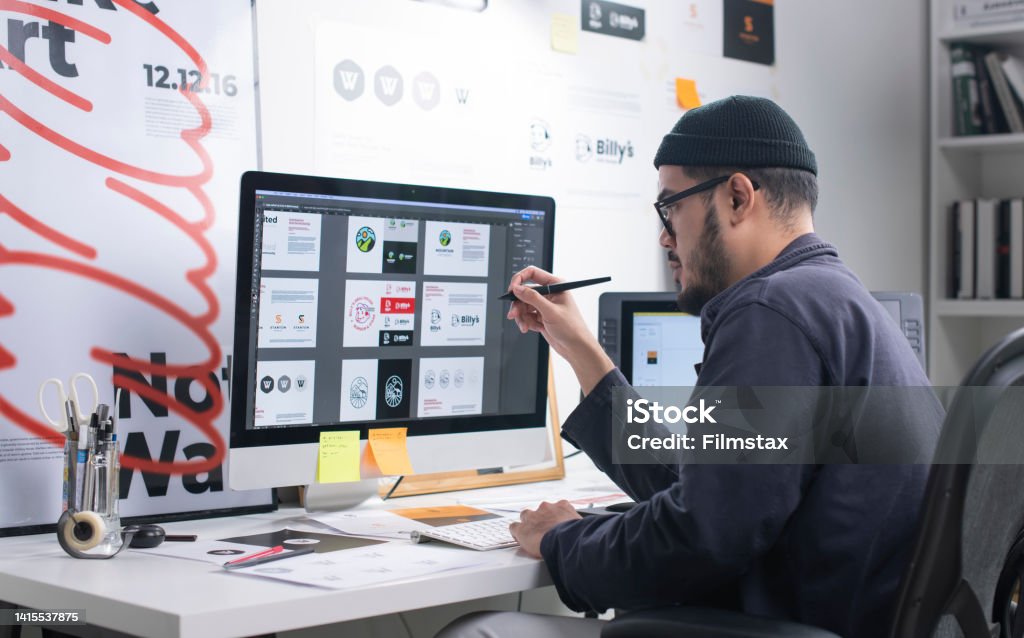 Asian Graphic designer working in office. Artist Creative Designer Illustrator Graphic Skill Concept. Graphic Designer Stock Photo