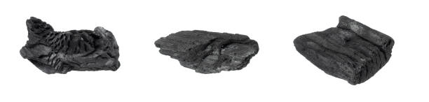 istock pieces of charcoal on a white isolated background 1415543746