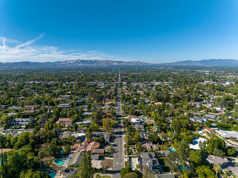 Aerial shot of Tarzana area and mountains in the San Fernando Valley of Los Angeles.
