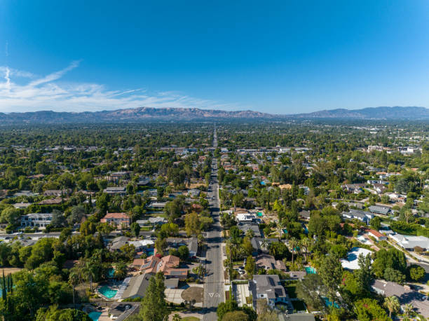 San Fernando Valley Aerial Los Angeles Aerial shot of Tarzana area and mountains in the San Fernando Valley of Los Angeles. encino california stock pictures, royalty-free photos & images