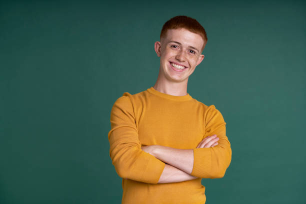 istock Portrait of smiling ginger young man 1415544442