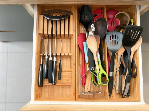 istock Overhead view of kitchen drawer with cutlery arrangement 1415548452