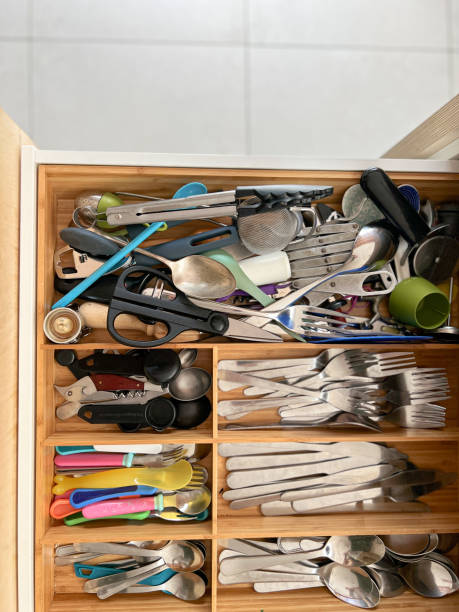 istock Overhead view of kitchen drawer with cutlery arrangement 1415548460