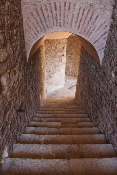 istock walkway with stone walls and stairs, view from above 1415554119