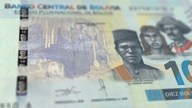 Banknotes of the Bolivia 10 Boliviano Observe and Reserve Side Close up of a Tracking Dolly Shot 10 Bolivian Notes Current 10 Bolivian Bolivianos Banknotes 4k Resolution stock video - Bolivia Money Currency Background Financial Inflation