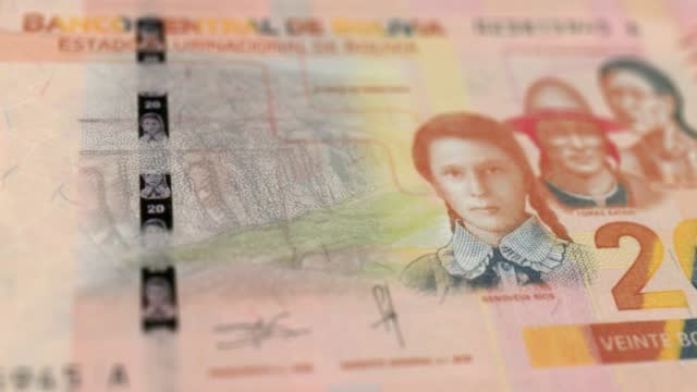 Banknotes of the Bolivia 20 Boliviano Observe and Reserve Side Close up of a Tracking Dolly Shot 20 Bolivian Notes Current 20 Bolivian Bolivianos Banknotes 4k Resolution stock video - Bolivia Money Currency Background Financial Inflation