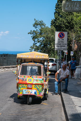 Taormina, Italy - July 10, 2022: A sweet seller near the old town of Taormina
