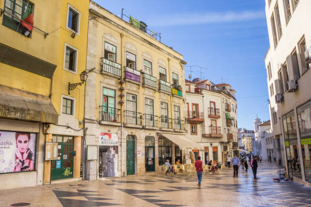 Street with a tiled floor in the center of Lisbon stock photo