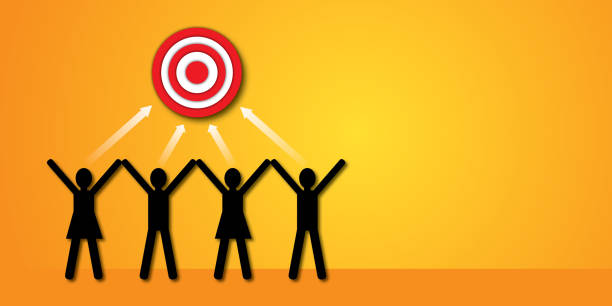 istock Men with women and white arrow to the target as metaphor for team work to be successful and achieve goals. 1415558198