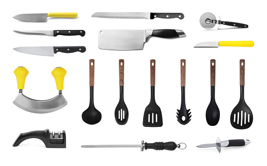 Set with different kitchen utensils on white background