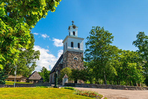 Rauma, Finland- June 20, 2022: Church of the Holy Cross of Rauma during summer, It is located in the UNESCO World Heritage Site of Old Rauma.