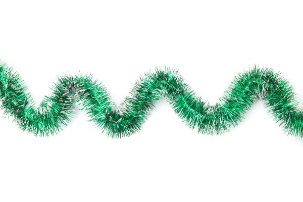 istock Shiny green tinsel isolated on white, top view 1415560944