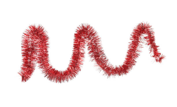 Shiny red tinsel isolated on white. Christmas decoration Shiny red tinsel isolated on white. Christmas decoration tinsel stock pictures, royalty-free photos & images