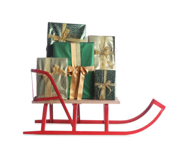 istock Sleigh with Christmas gifts on white background 1415561489