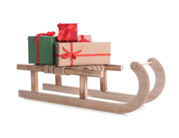 istock Sleigh with Christmas gifts on white background 1415561555