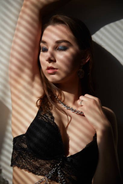 istock woman in sun light 1415561874
