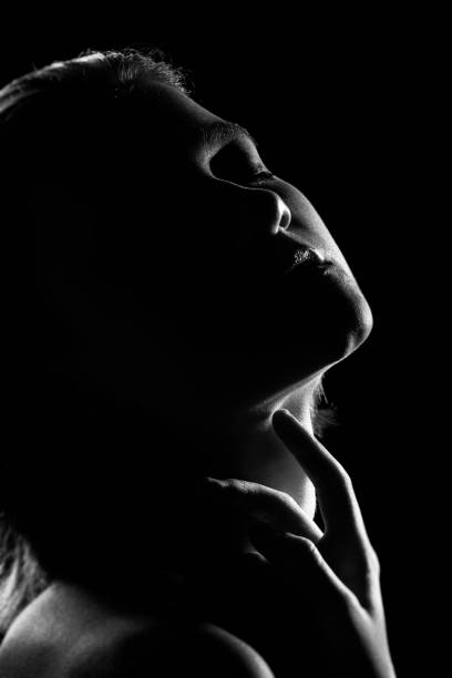 istock woman in dark 1415562694