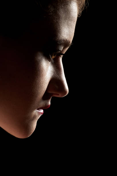 istock sad female silhouette 1415562783