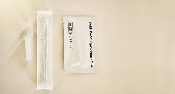 istock One step Covid testing equipment or antigen test kit on a table with copy scape. Above view of coronavirus infection detection home gear with nasal swab. Covid19 antibody diagnostic or examine tools 1415563122