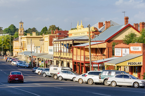 Beechworth, Victoria, Australia - April 12, 2018: Main shopping strip lined with historic preserved buildings on Ford Street