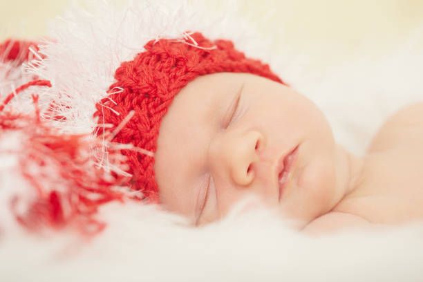 istock newborn girl sleeping 1415566128