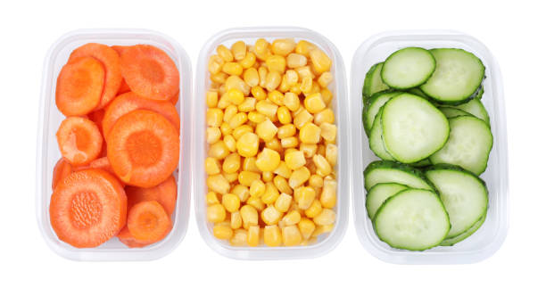 istock Fresh vegetables in plastic containers on white background, top view 1415566181