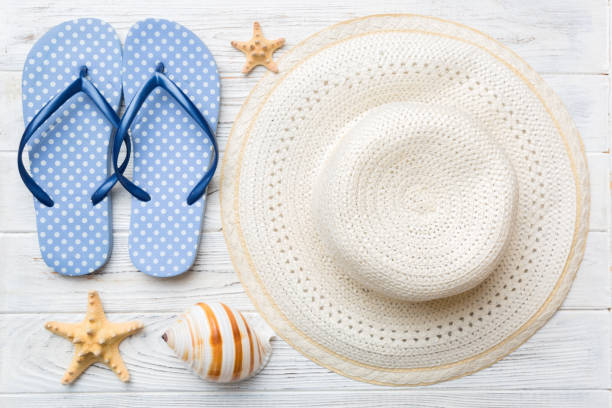 istock Summer vacation concept flat lay. straw hat beach accessories and towel top view. Space for text. travel concept 1415567477