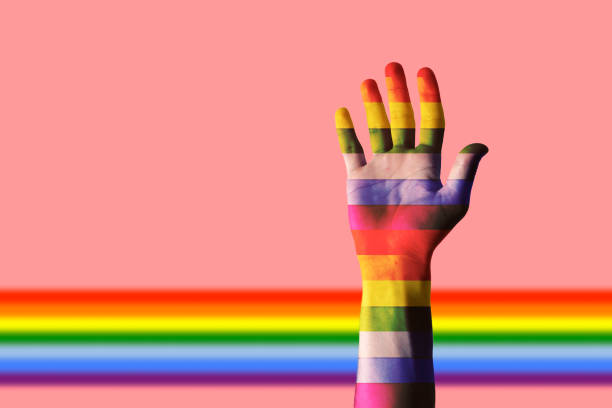 istock hand colored with rainbow color, lgbt pride and diversity 1415574432