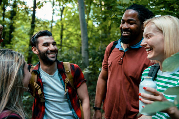 istock Laughing with friends in nature 1415578526