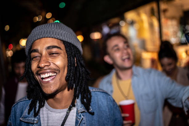 istock Happy man enjoying nightlife with friends 1415579344