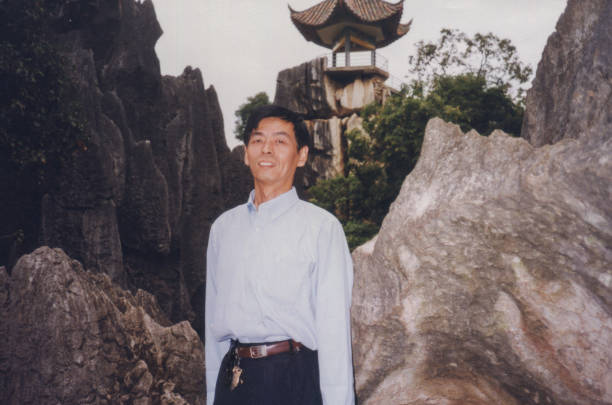 istock 1990s Chinese Men Real Life Old Photo 1415580743