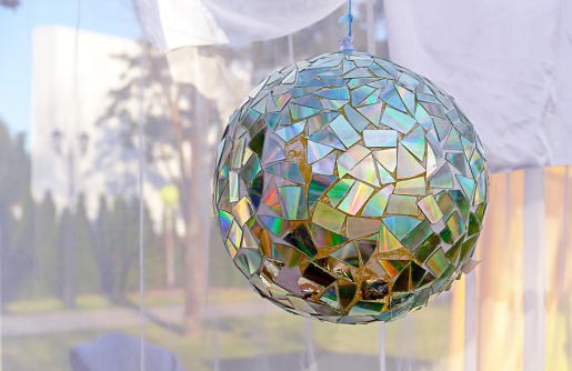 Disco ball from broken CDs for holidays and parties.