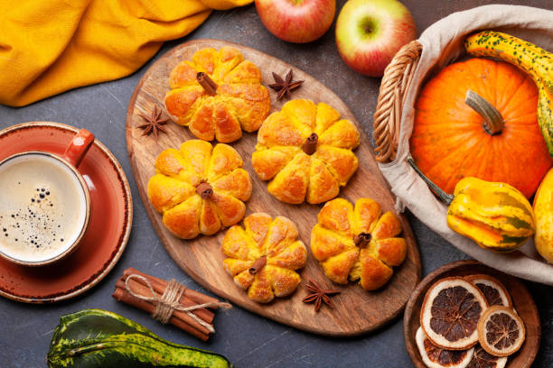 istock Pumpkin muffins and various pumpkins 1415586900