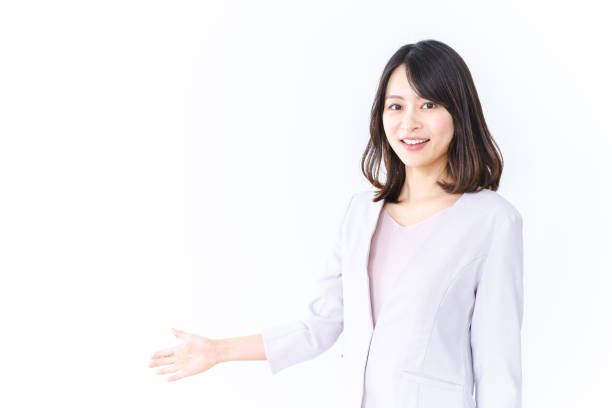 istock Woman giving directions with a smile 1415587297