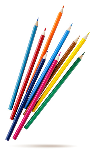 Colored pencils fly on a white background. Isolated