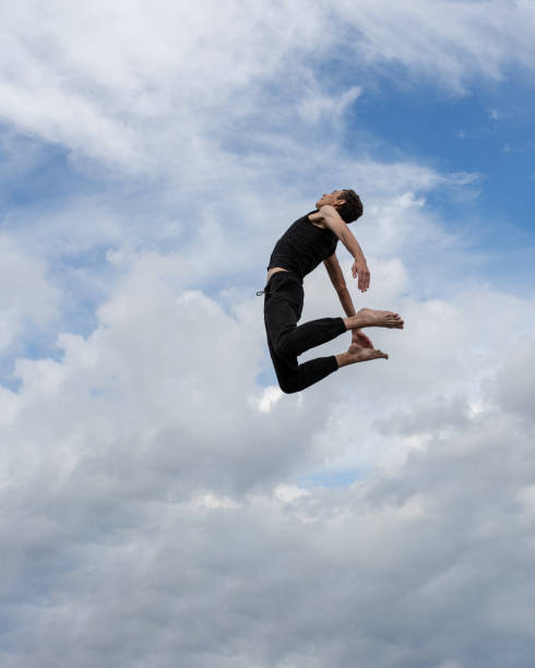 istock Man jumping in the air 1415588880
