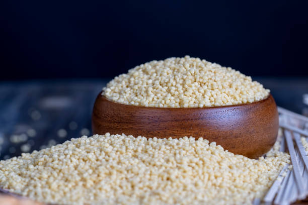 istock Fresh raw porridge couscous from wheat or millet 1415590986