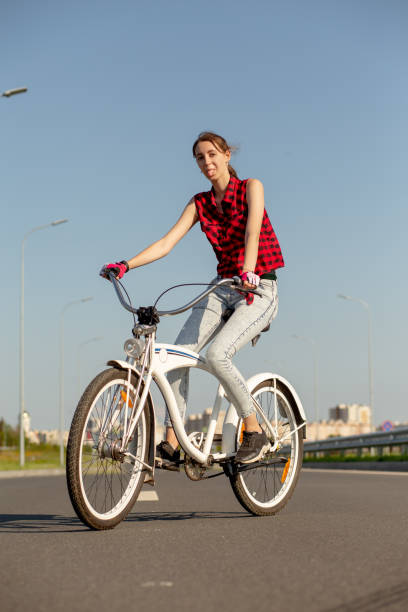 istock young woman cyclist 1415593624