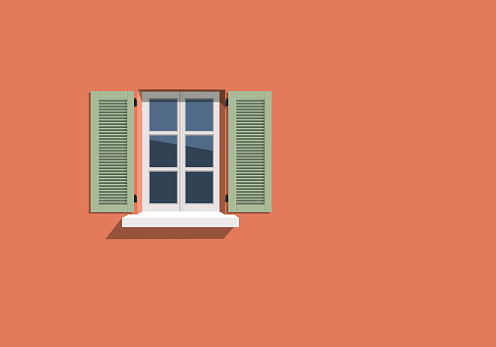 Background of a wall with a window and green shutters on the facade of a house painted in orange.