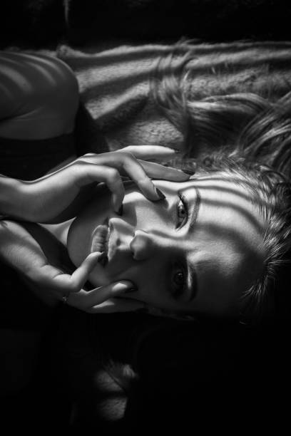 istock sensual girl lying 1415595644
