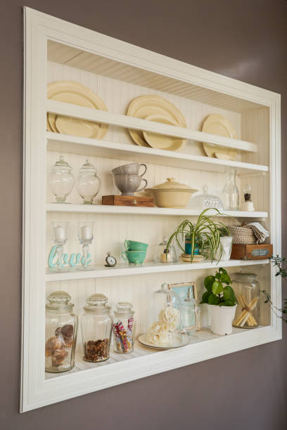 istock Vintage kitchen decorated with plates, glass kitchen items, mugs and plants. 1415599320