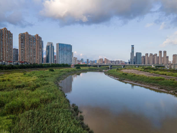 istock Urban buildings along the river 1415599931