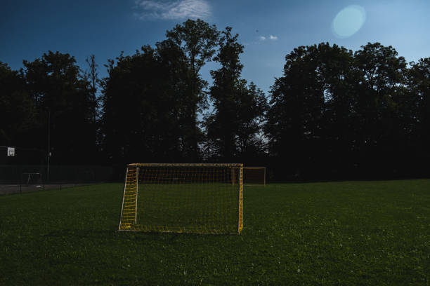 istock Yellow soccer goal outside 1415603596