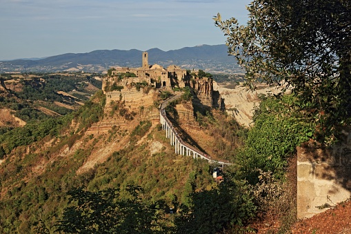 ‎The citadel of Civita di Bagnoregio‎‎ is located on the top of a remarkable hill and offers itself an incomparable spectacle to those who observe it from the panoramic points of Bagnoregio.‎ ‎The wonderful village of Civita di Bagnoregio‎‎, the so-called ‎‎Civita that dies‎‎ is a very small town where time seems to have stopped and where you can only reach it on foot, along a reinforced concrete bridge built for the benefit of the few remaining citizens and tourists ‎‎who visit it from all over the world.‎
‎The charming medieval village, known throughout the world as 