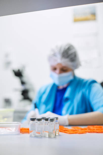 istock Women work in the lab. Conducts experiments on vaccines. 1415608308