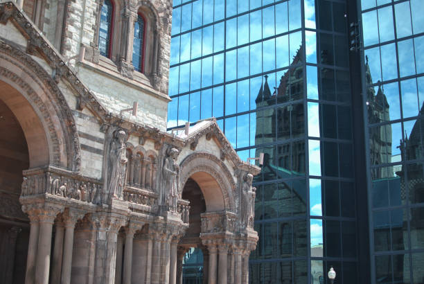 istock Trinity churh and is reflect on a modern building 1415608332