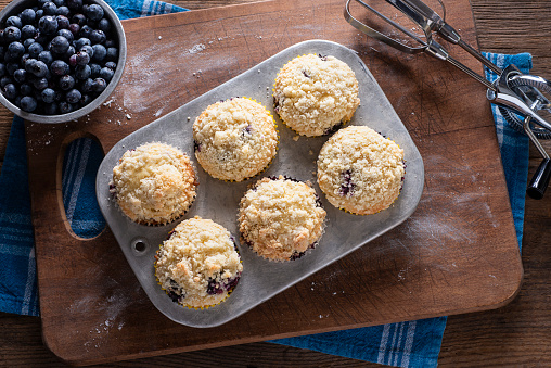 Muffin Tin of Blueberry Muffins with a Crumble or Streusel Top