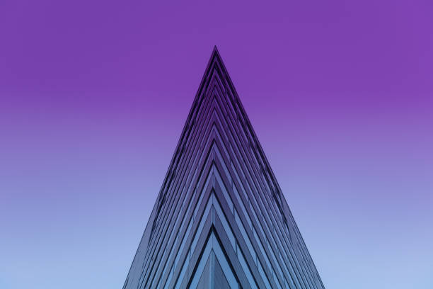 Pyramidal office building Toned image of exterior of pyramidal office building abstract sharp stock pictures, royalty-free photos & images