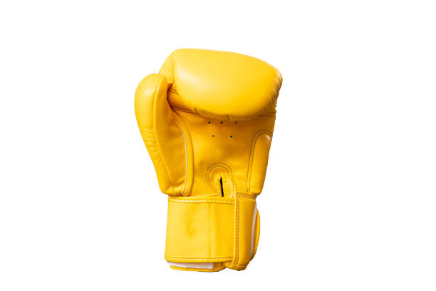 istock yellow boxing gloves isolated background. 1415610665