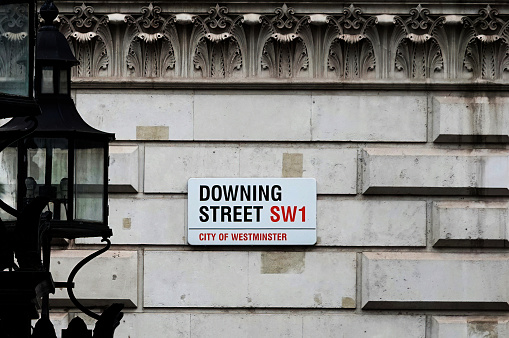 London, UK - June 24, 2022: Downing Street sign on the wall of a building in London, UK.